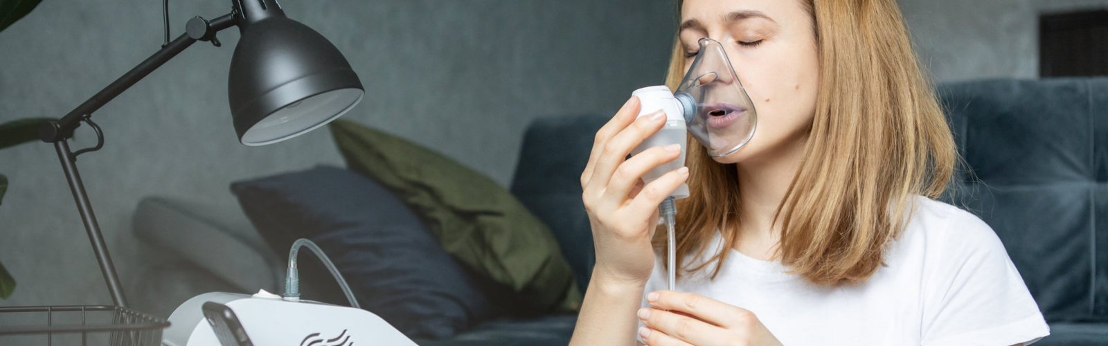 Healthcare professional with nebulizer equipment