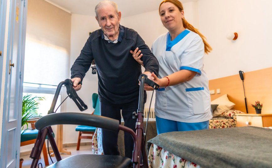 caregiver helping senior