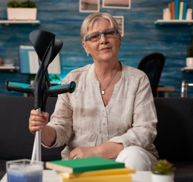 woman holding crutches